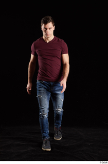 Tomas Salek 1 blue jeans dressed front view grey shoes…